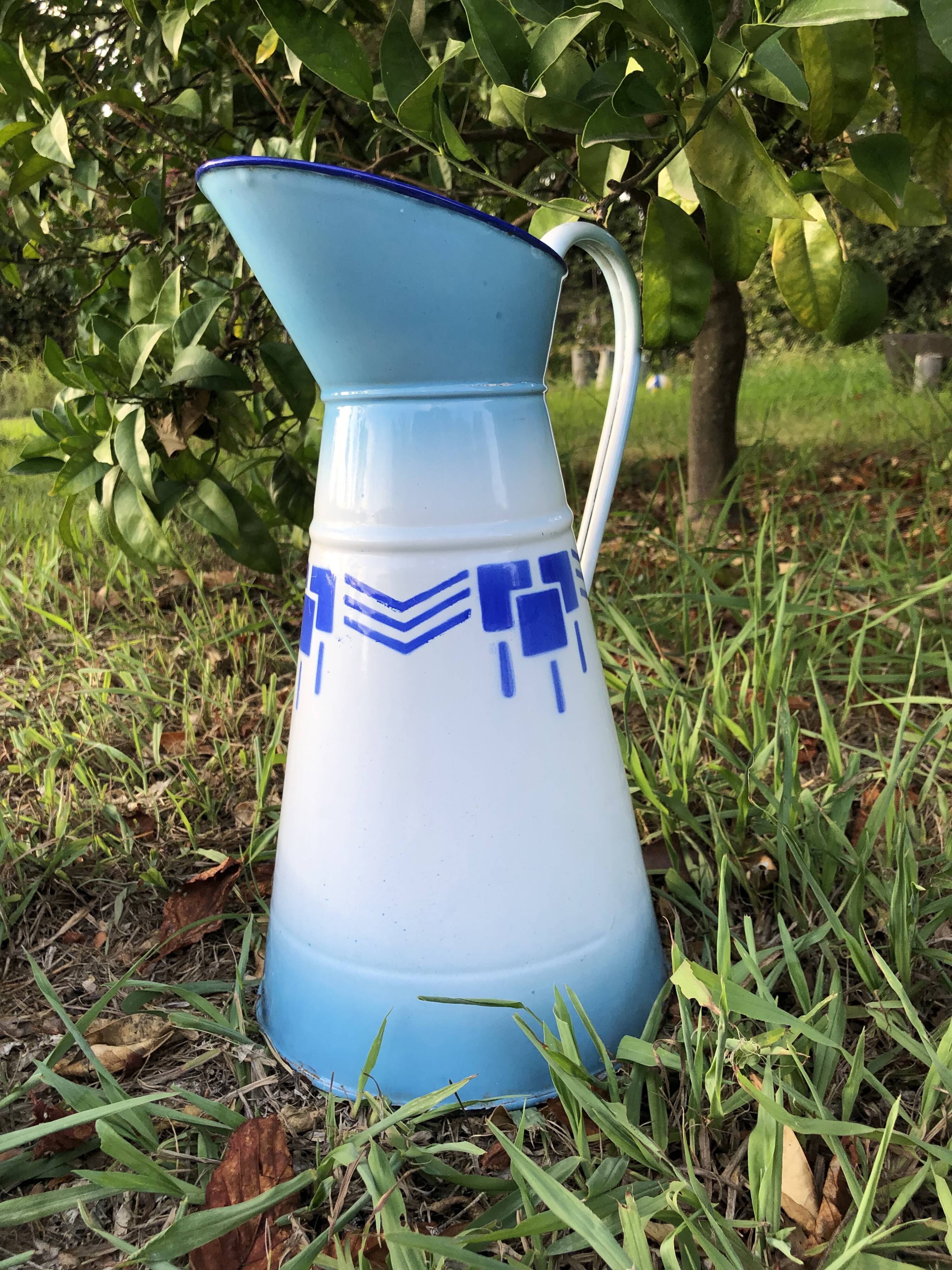 Enamelled jug, bowl and bucket