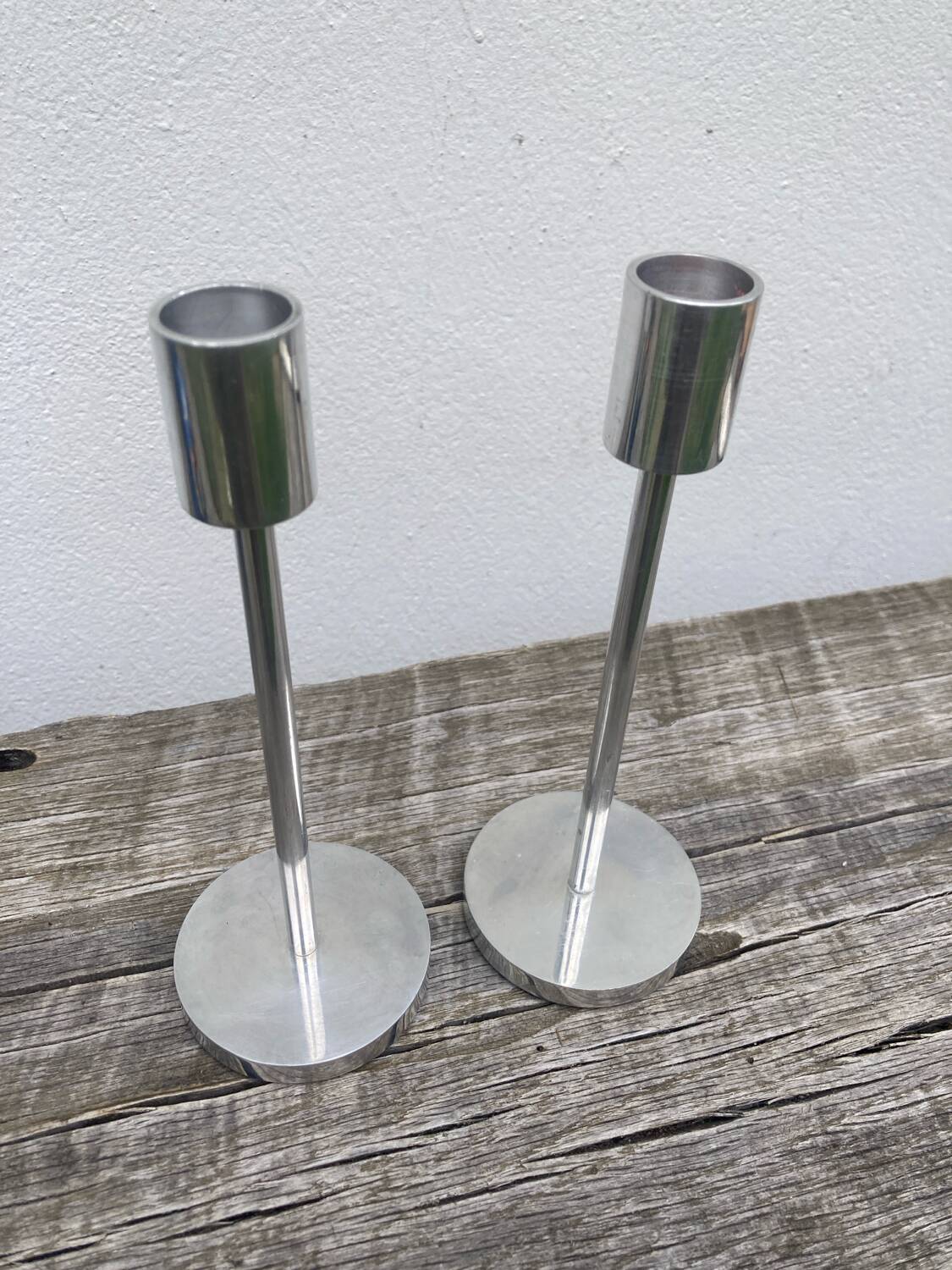 Pair of modernist aluminum candlesticks