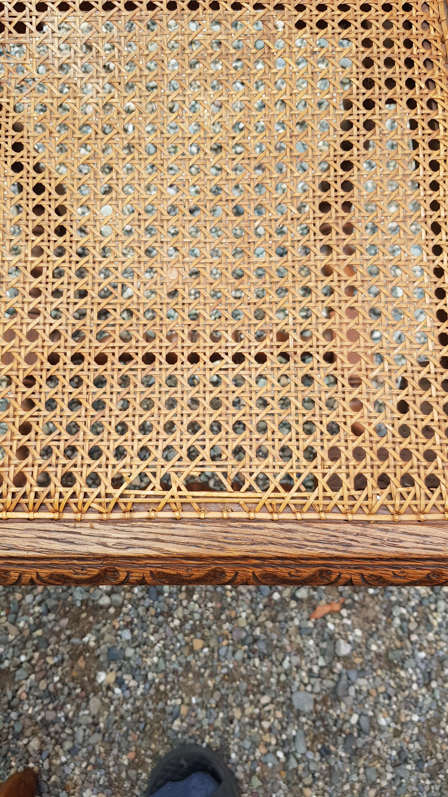 Carved antique chairs with rattan seat
