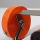 Vintage adjustable spot lamp, orange aluminium design from the 1970s.