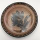 Lot 2 assiettes en grès pyrité émaillé à décor floral h. siegfried, souffle