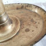 Brass pusher candle holder on oval frame
