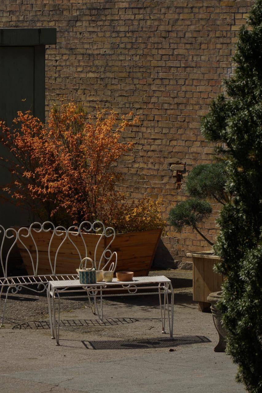 Metal coffee table in French garden style, mid-century modern, with perforated top, 1950s.