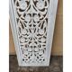 Decorative wooden panel with carved and openwork design.