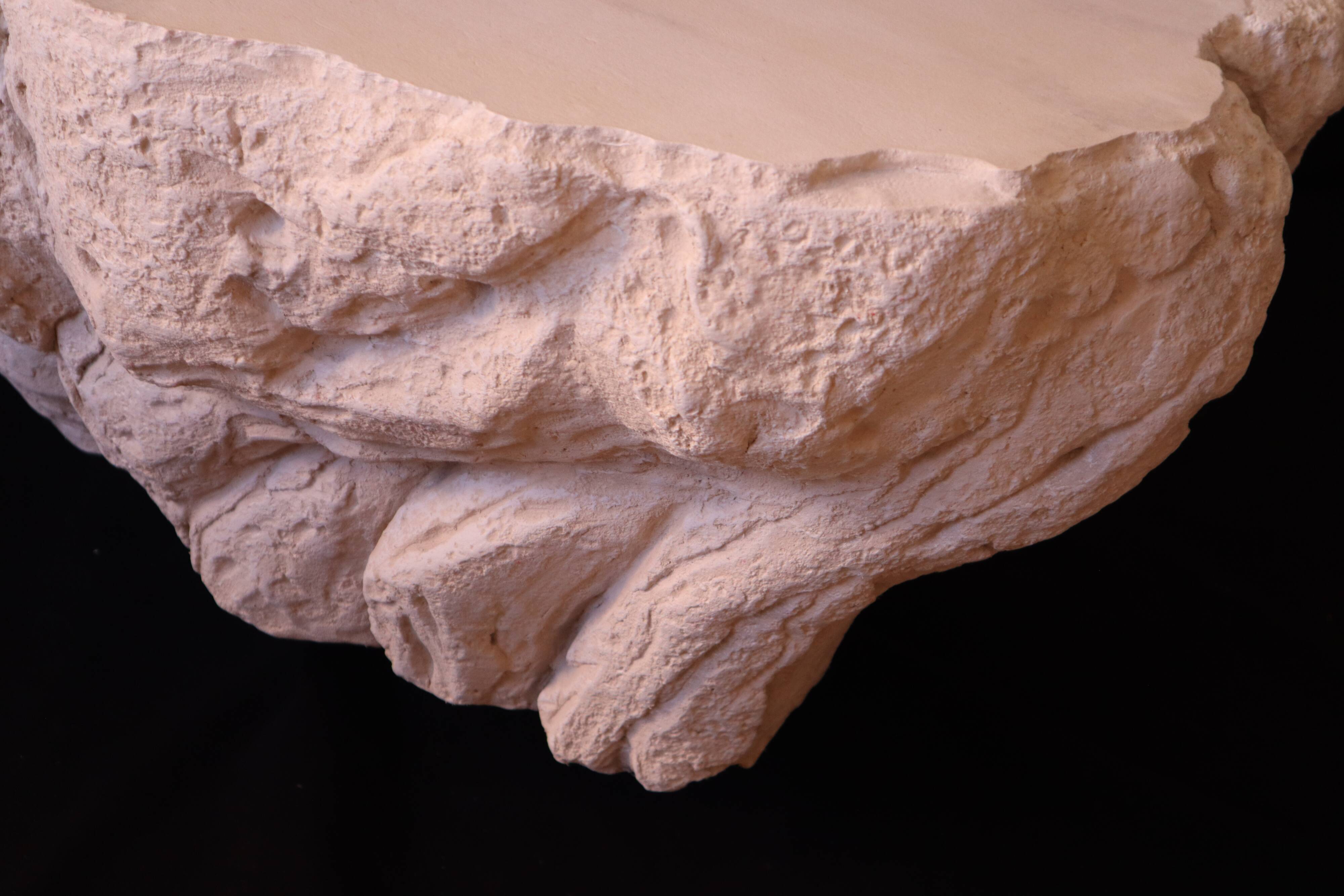 Design coffee table with travertine rock effect — unique piece hand-sculpted.