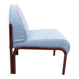 Souvignet armchair reupholstered in sky blue boucle.