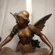 Pair of art nouveau candle holders in regulates