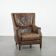 Very comfortable vintage cow leather armchair with beautiful colours