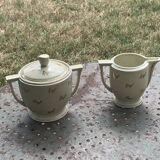 Antique porcelain sugar bowl and milk jug from the Royal Factory of Limoges, France