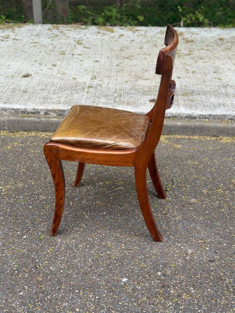 4 Regency chairs in solid wood and brown-beige leather from the 19th century.