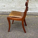 4 Regency chairs in solid wood and brown-beige leather from the 19th century.