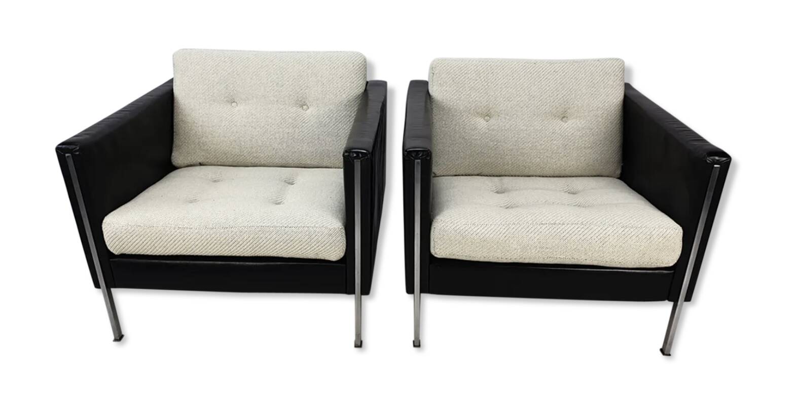 Pair of armchairs by Pierre Paulin for Artifort, black leather and cream fabric.
