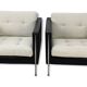 Pair of armchairs by Pierre Paulin for Artifort, black leather and cream fabric.