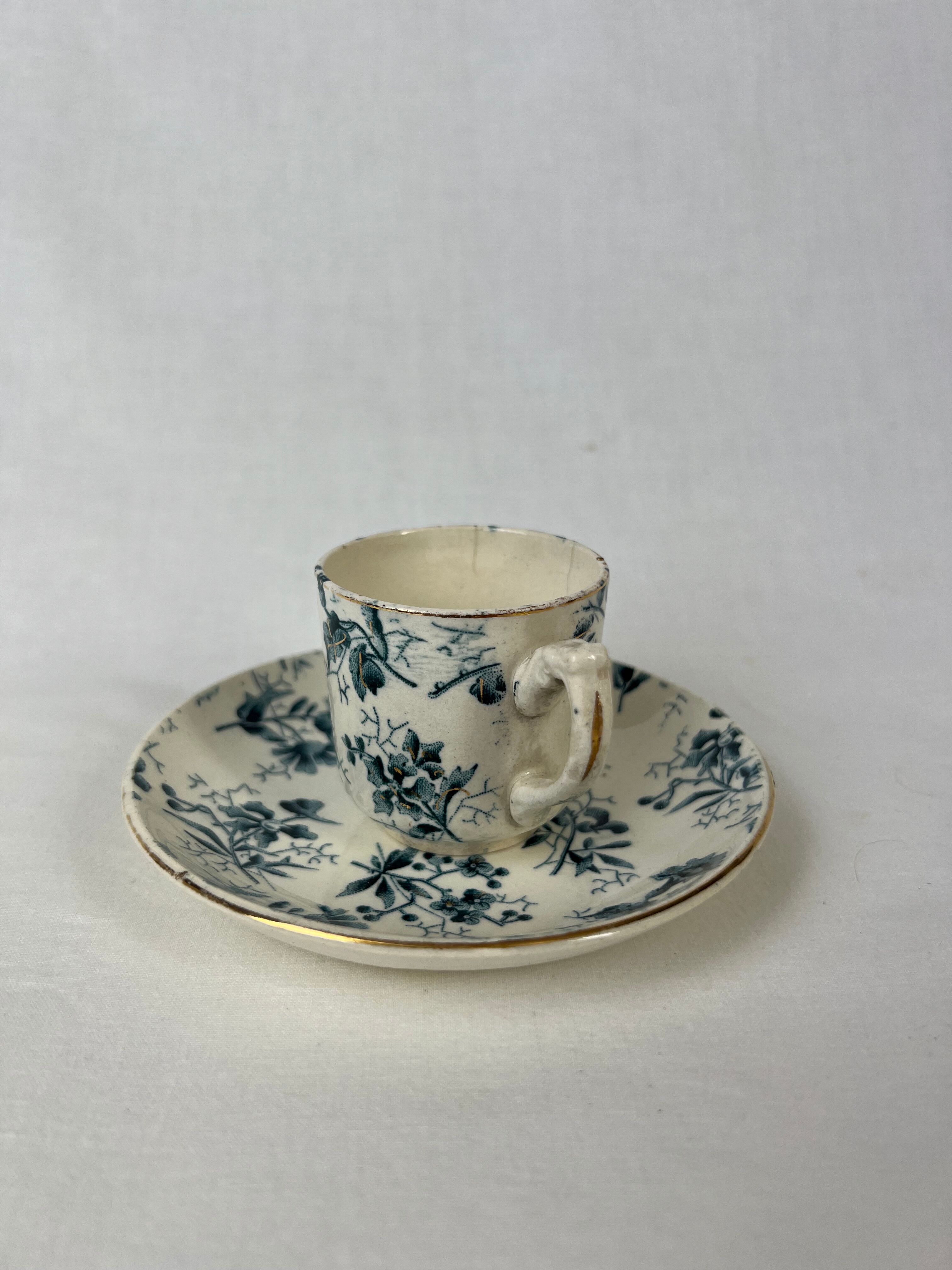 White porcelain cup with blue flowers