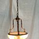 Vintage suspension in gilded brass and pressed glass