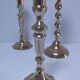 Three vintage solid brass candle holders