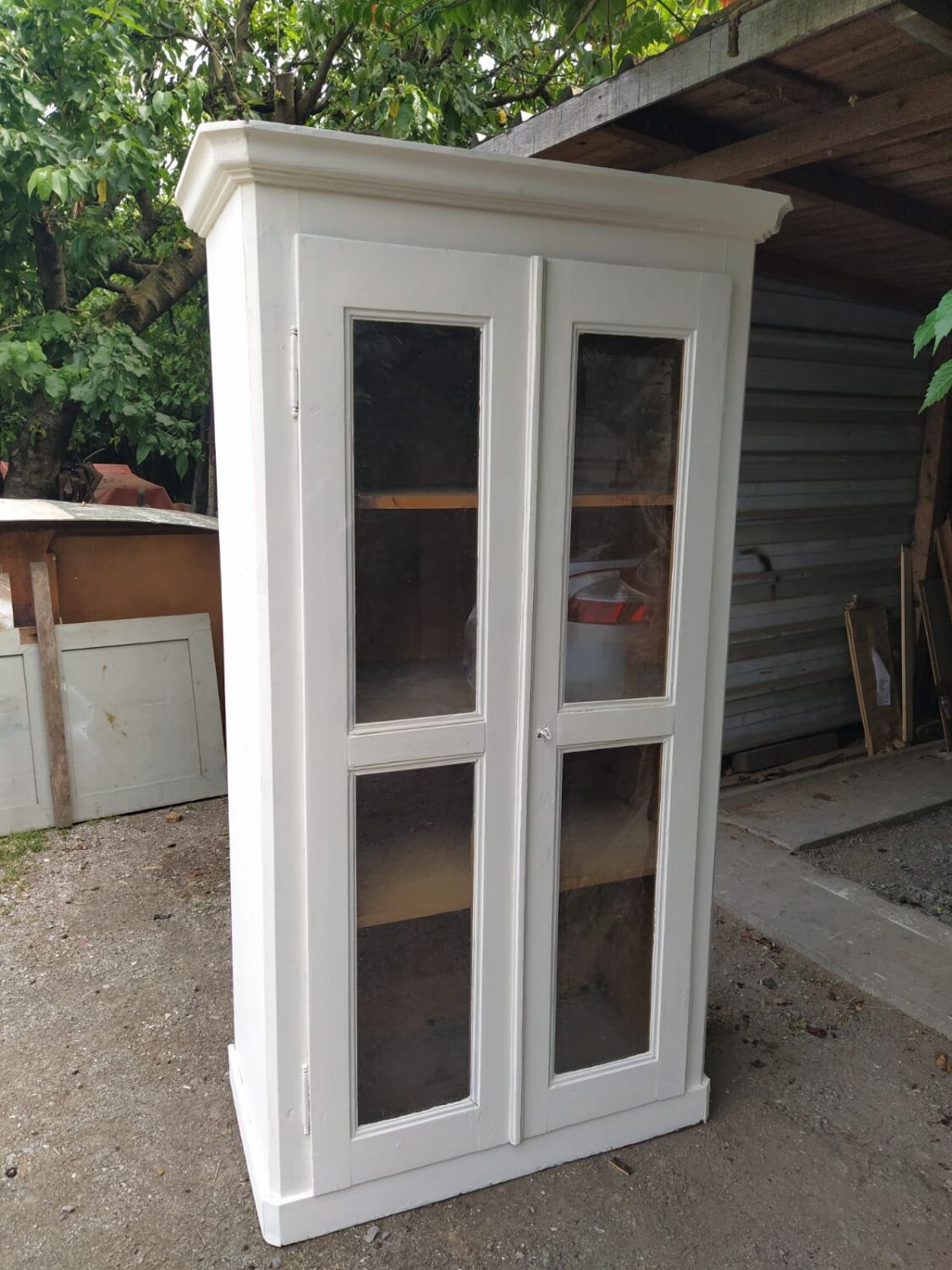 Patinated white bookcase