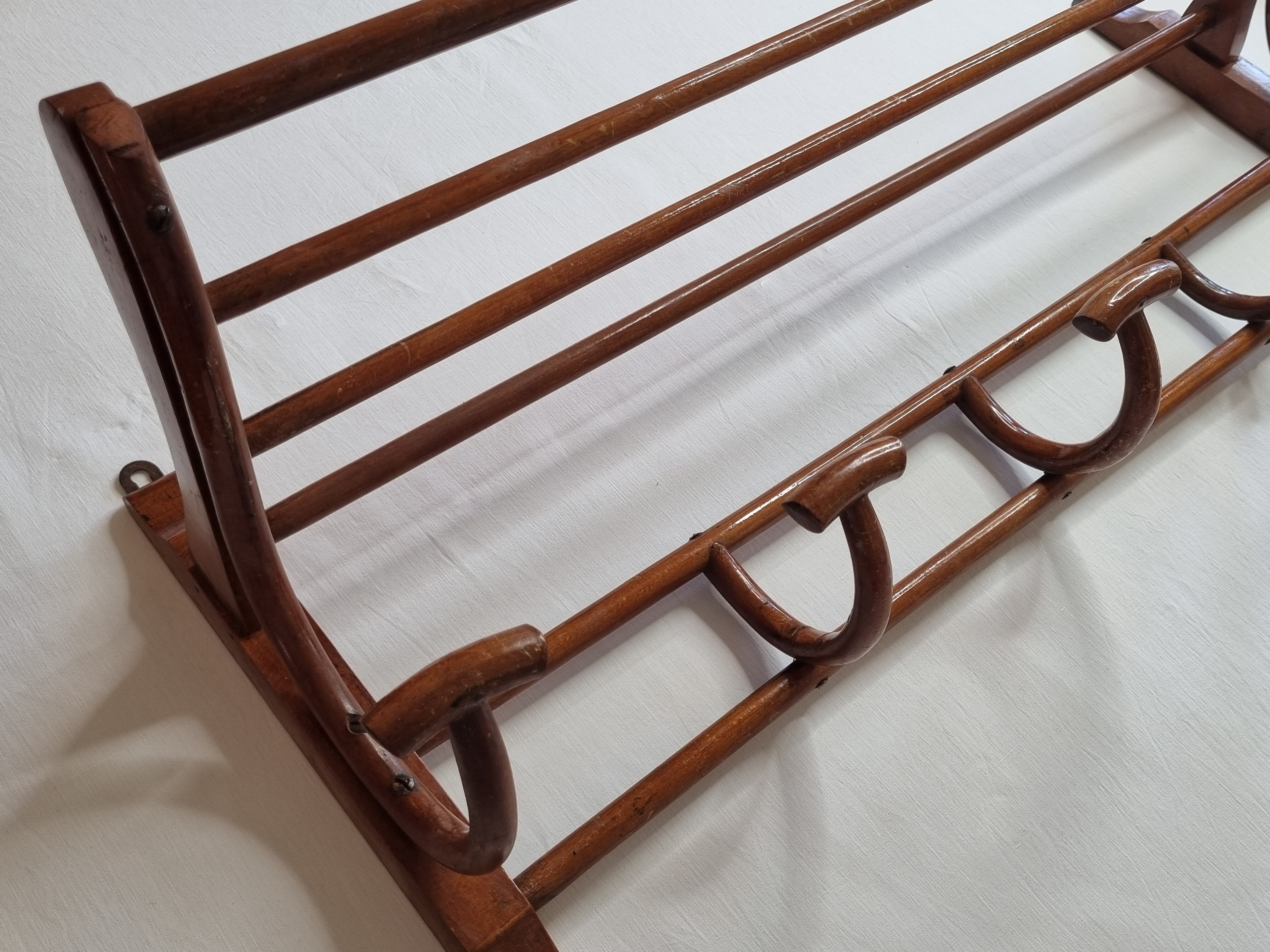 Old wall rack in curved wood, 1900s era