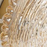 Amber glass wall sconces in the shape of a fingerprint, Germany, 1970s.