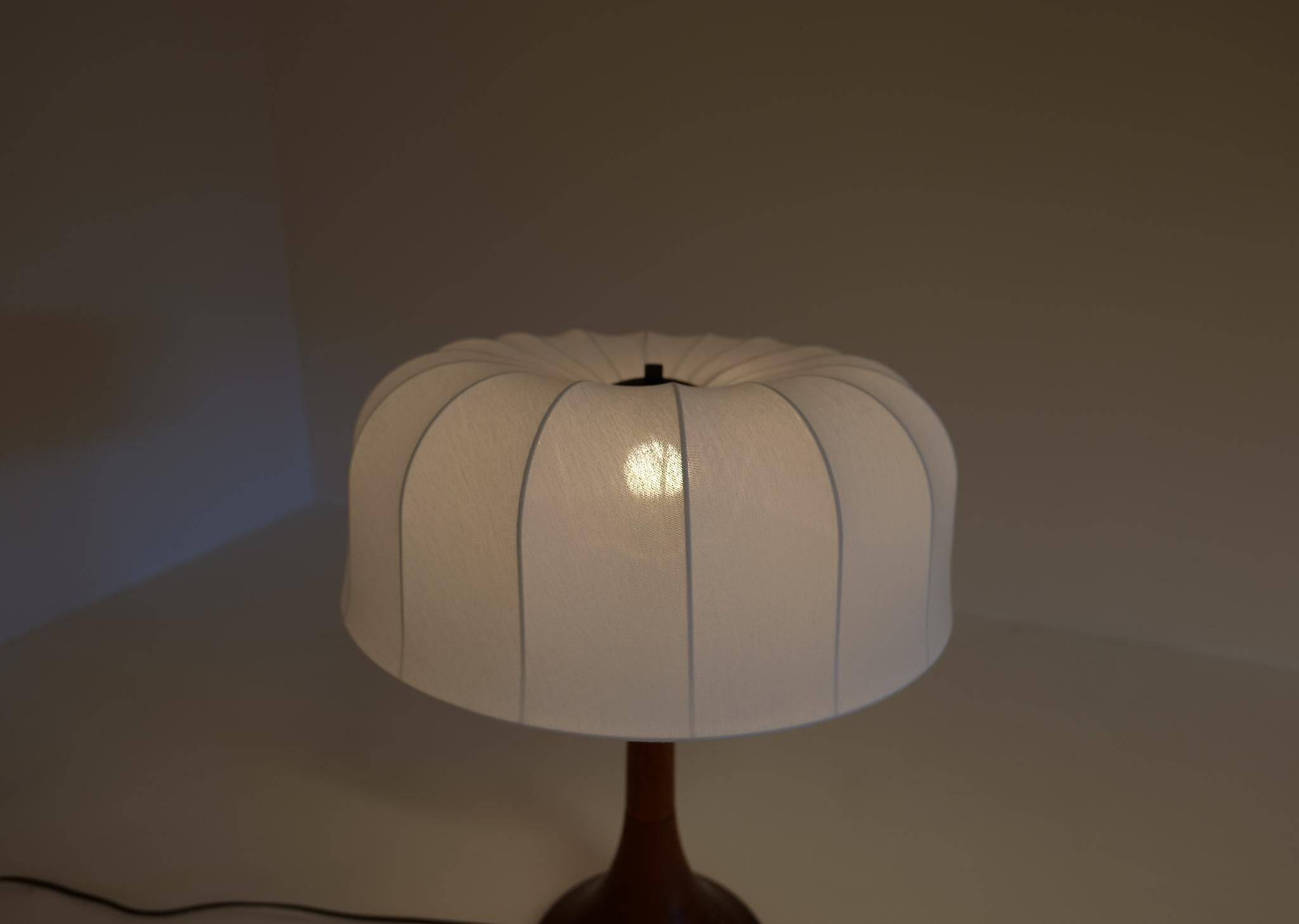 Mid-century table lamp in solid teak by Lisbeth Brams, Denmark, 1960s.