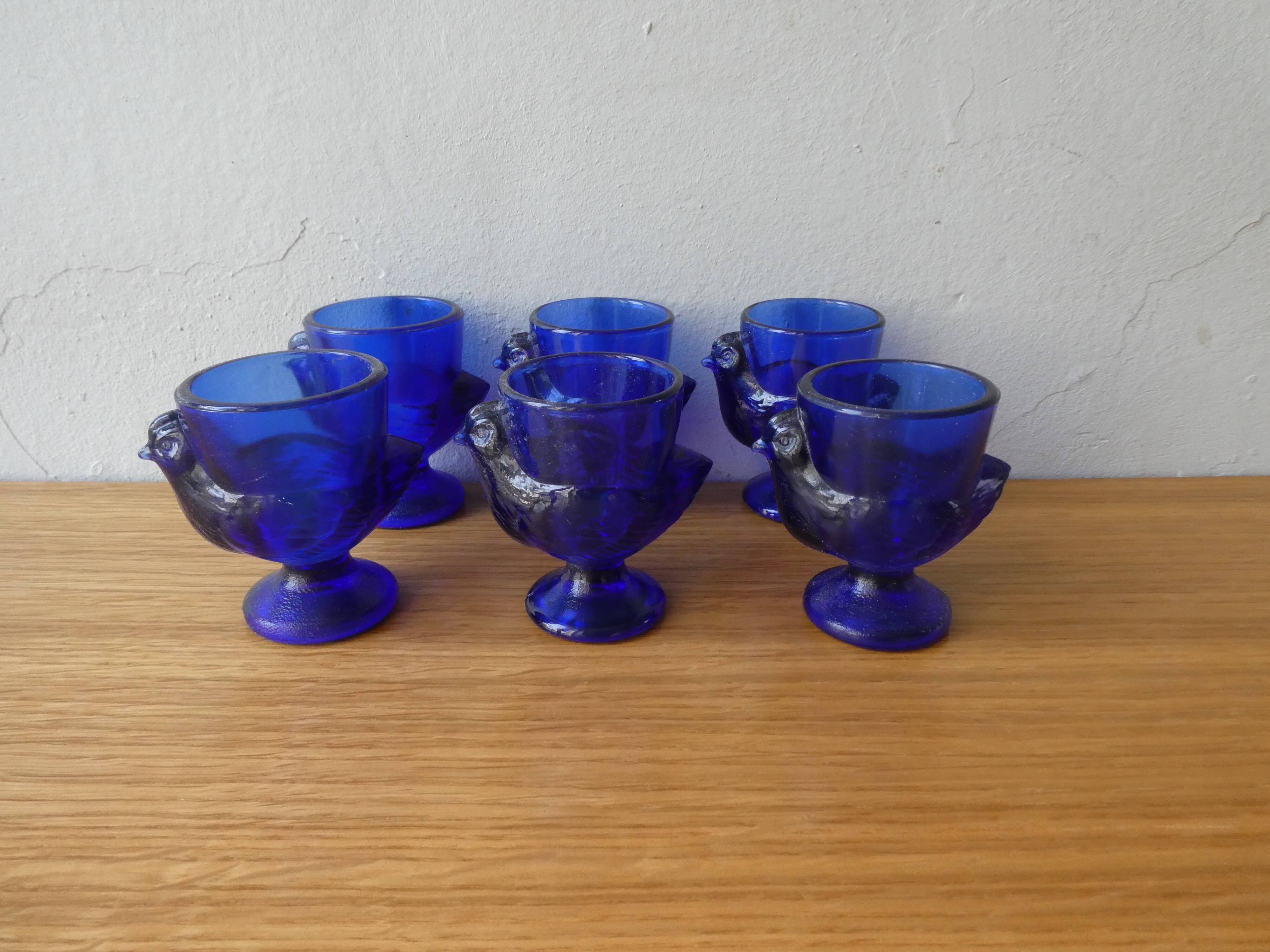 6 blue glass coquetiers, hen shape, France, 70s