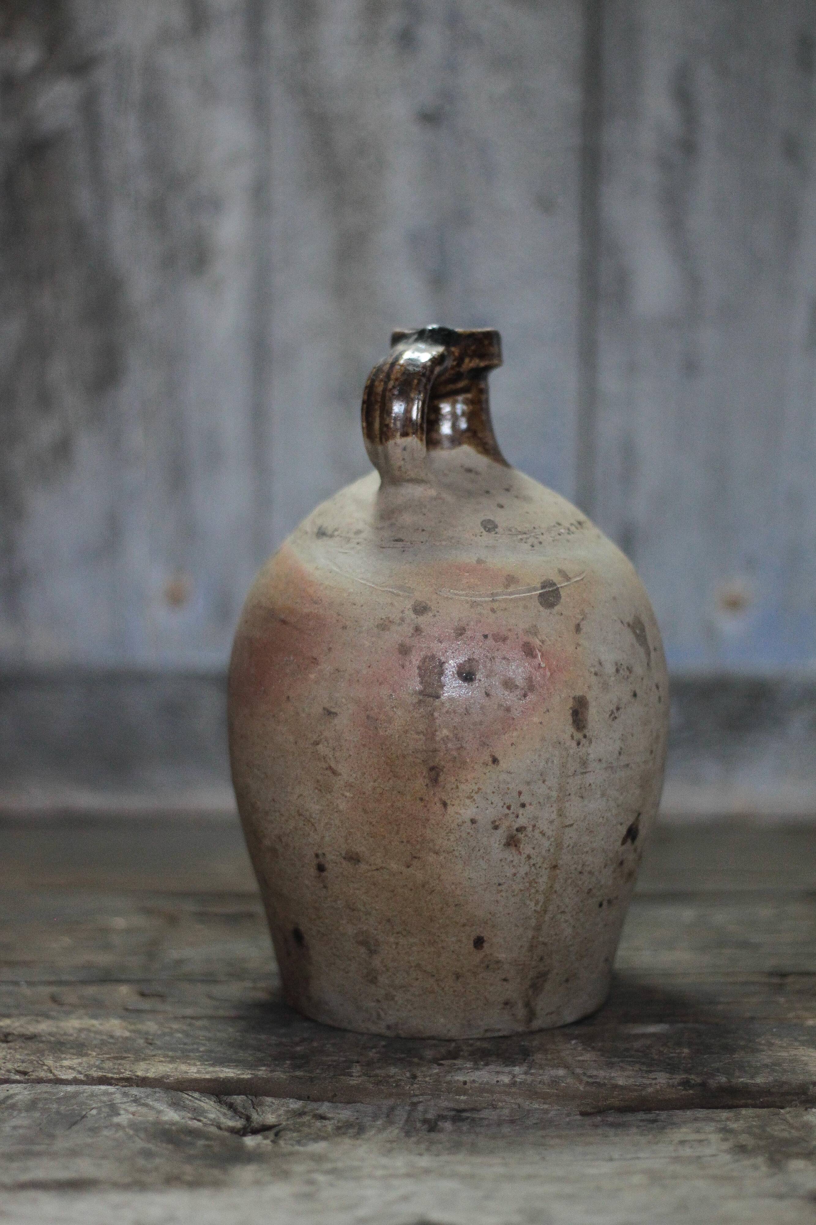 Antique handled pot, antique pot, handled jar, interior decoration.
