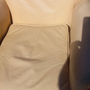 Pair of 1930s club armchairs in ivory leather.