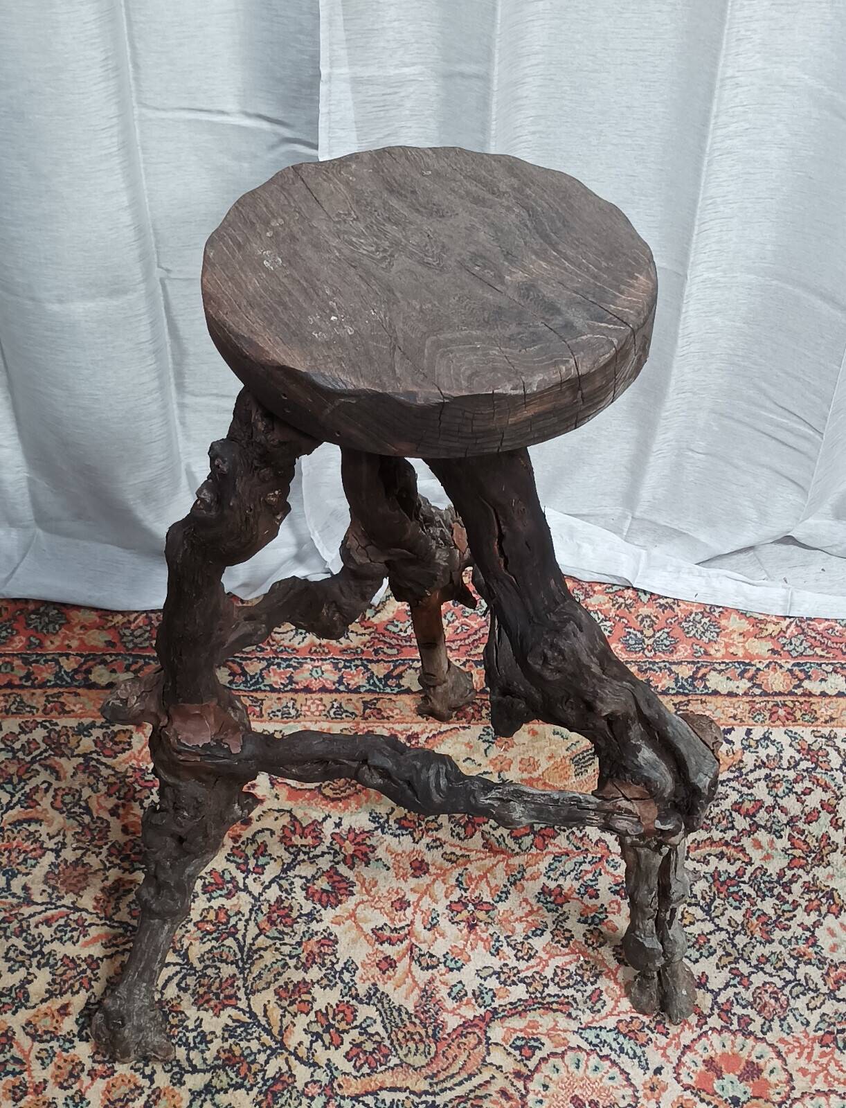Brutalist bar stool made of vine wood