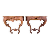 Pair of carved wall consoles in Louis XV style