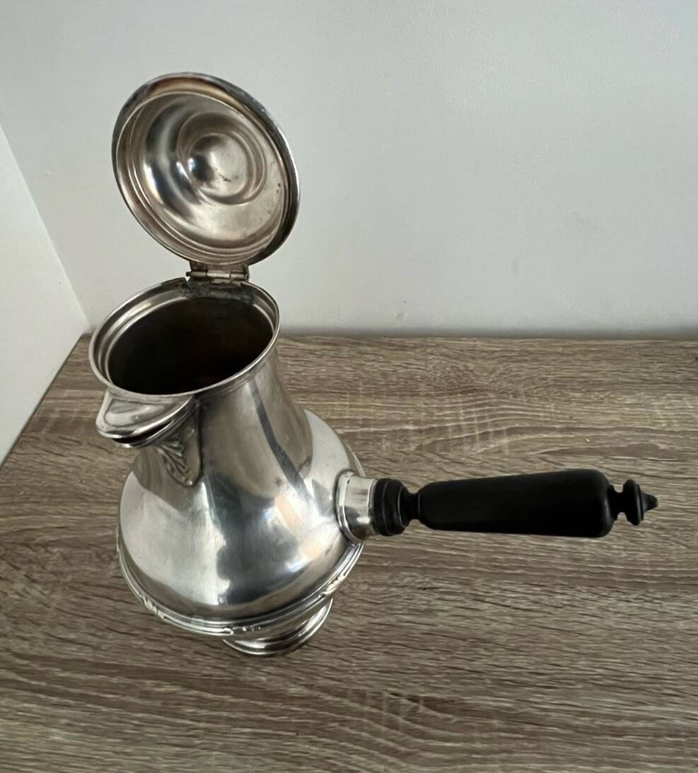 Silver-plated metal chocolate pot stamped ARGIT SFOA with an ebony handle.
