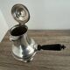 Silver-plated metal chocolate pot stamped ARGIT SFOA with an ebony handle.