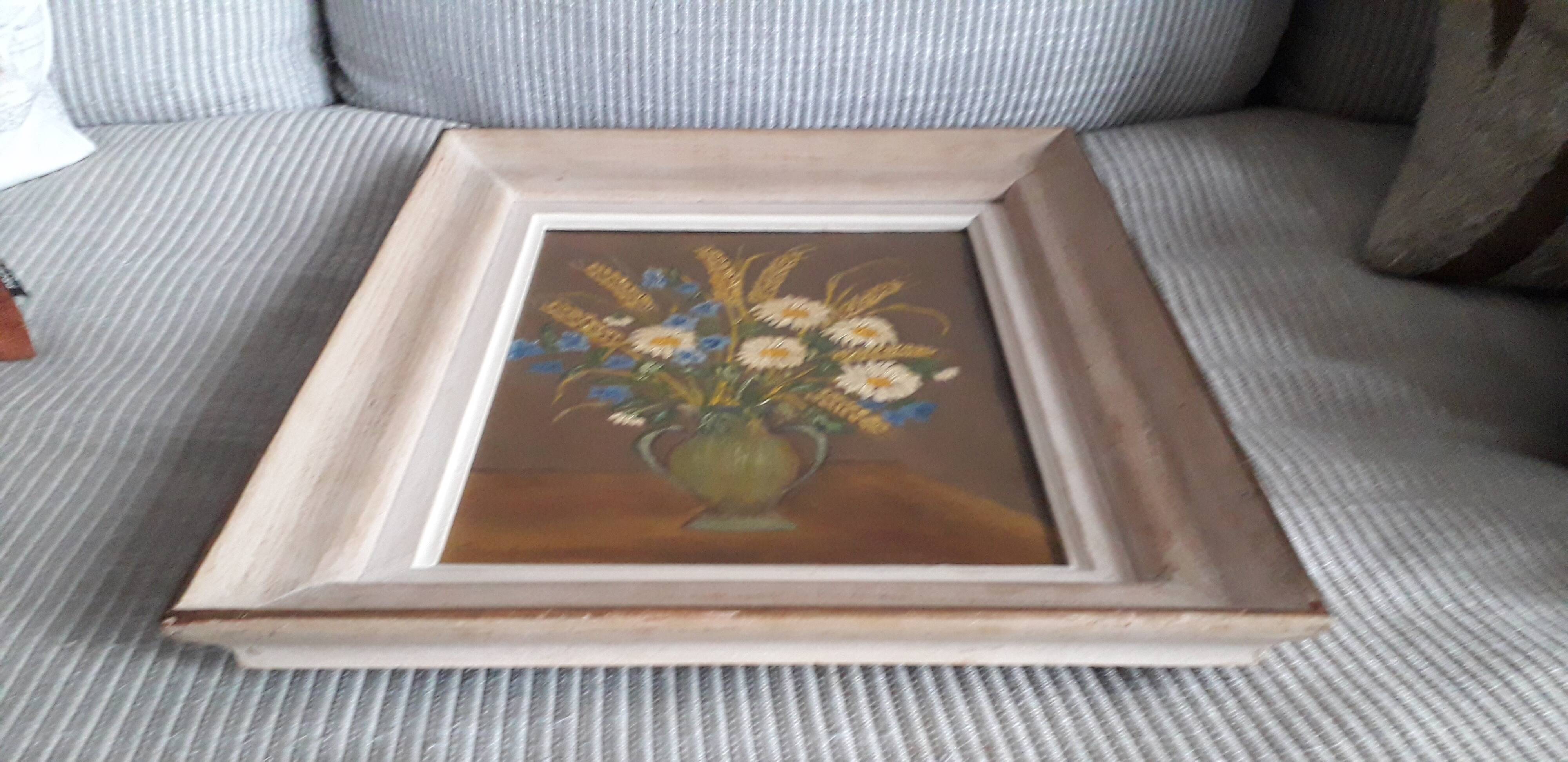 Tableau ancien à l'huile représentant un bouquet de fleurs