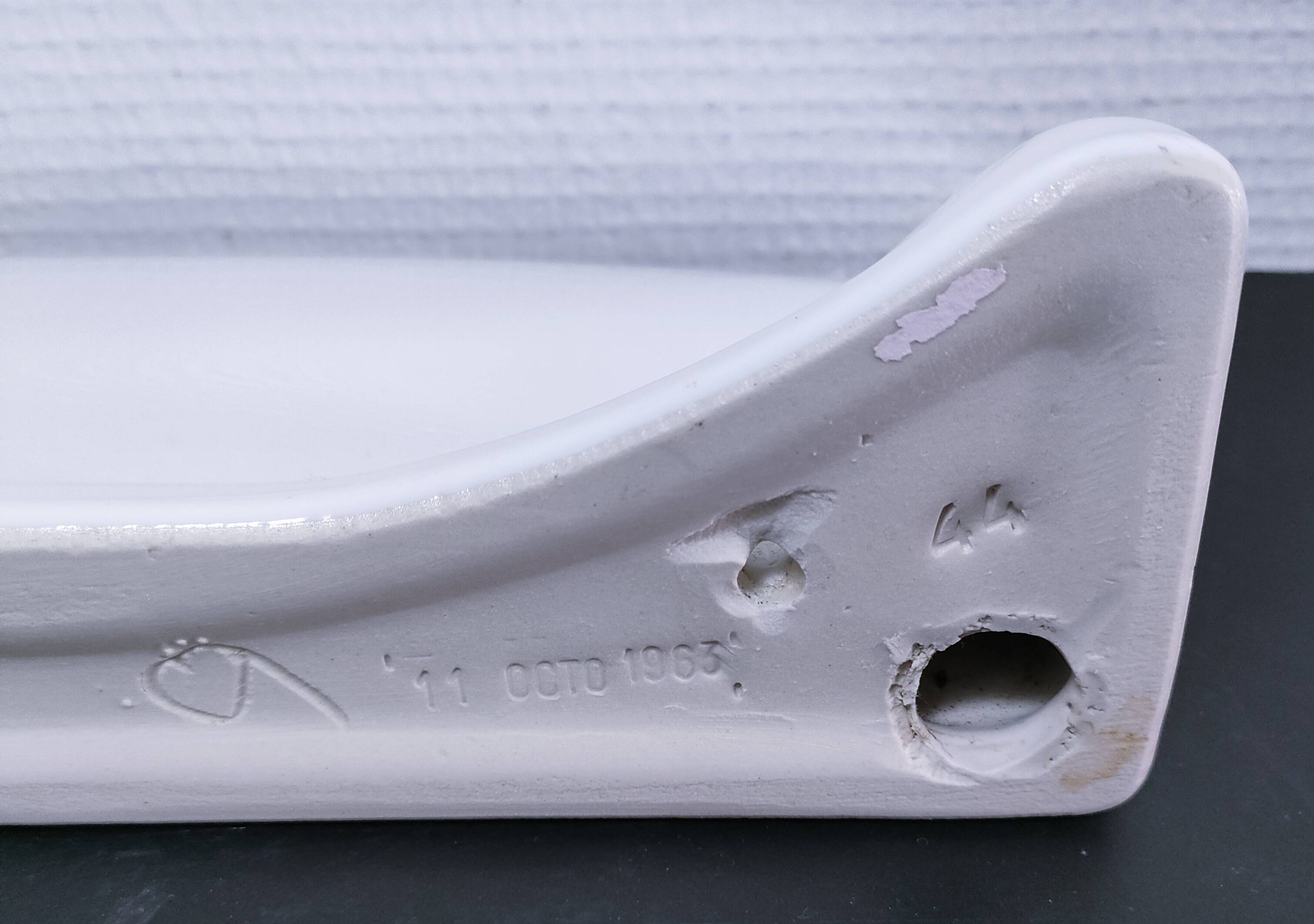 white glazed ceramic wall shelf from the 60s
