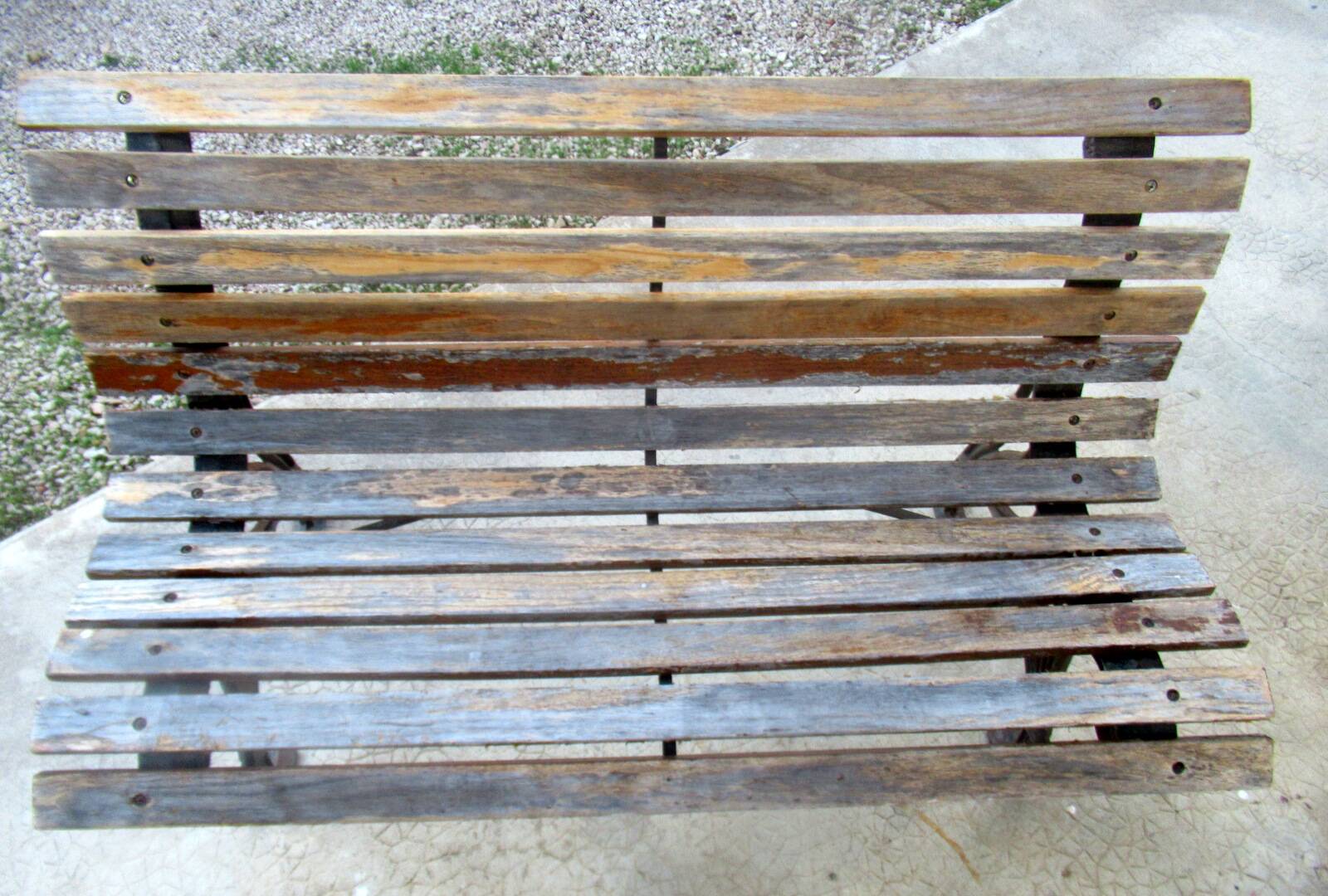 Small garden bench, with cast iron legs.