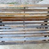 Small garden bench, with cast iron legs.