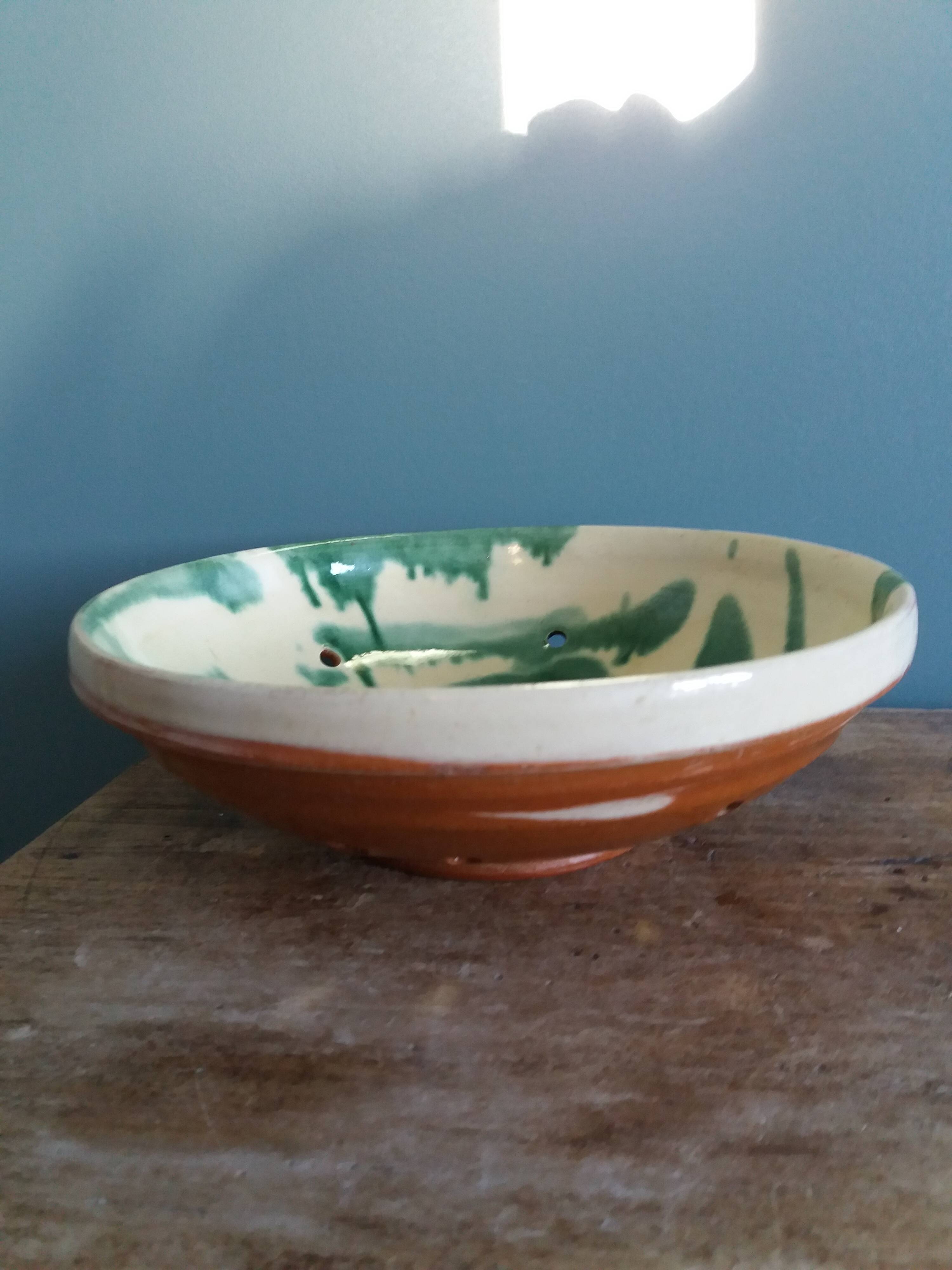 Glazed terracotta fruit bowl strainer