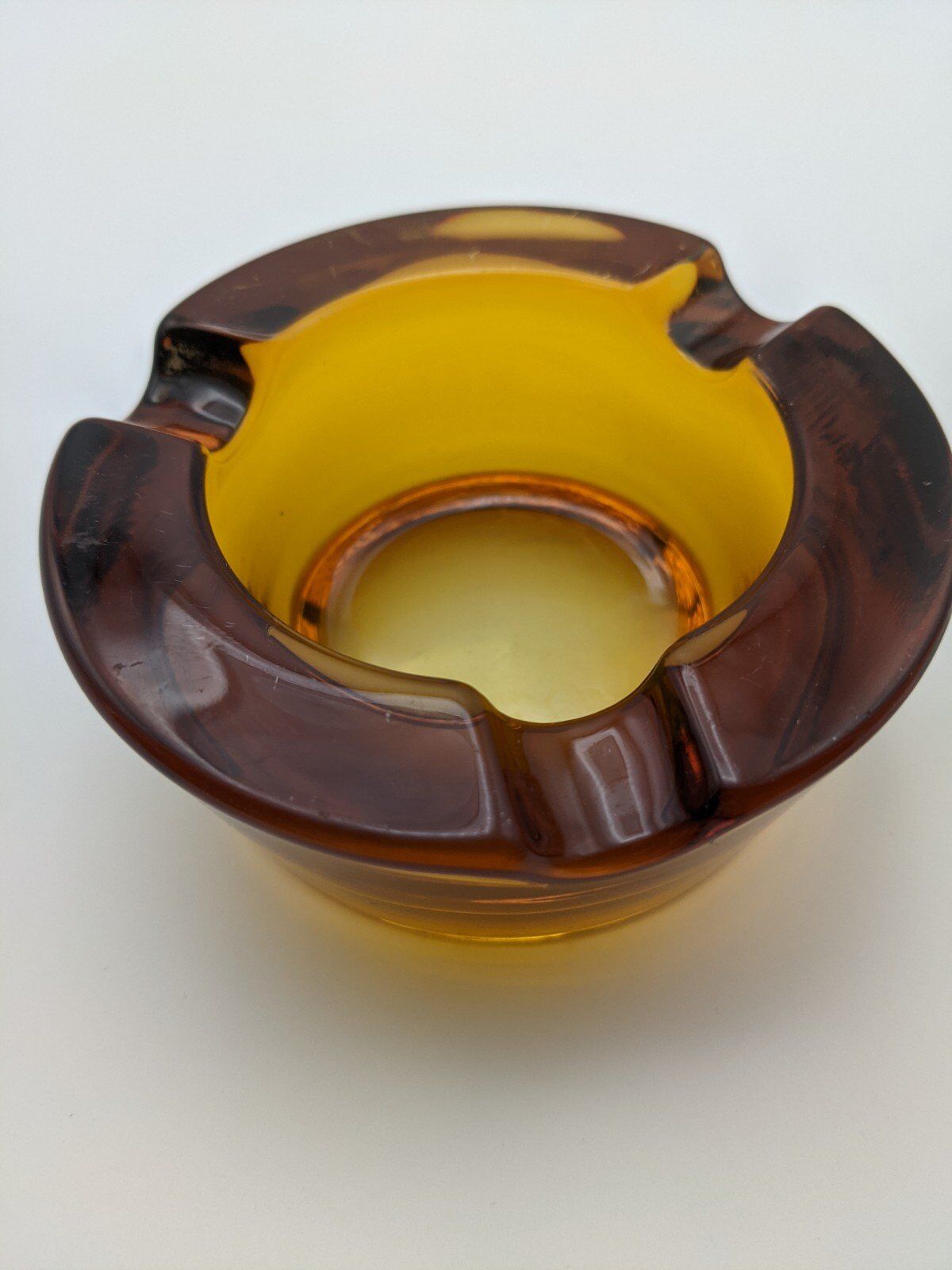 Amber glass ashtray 70s