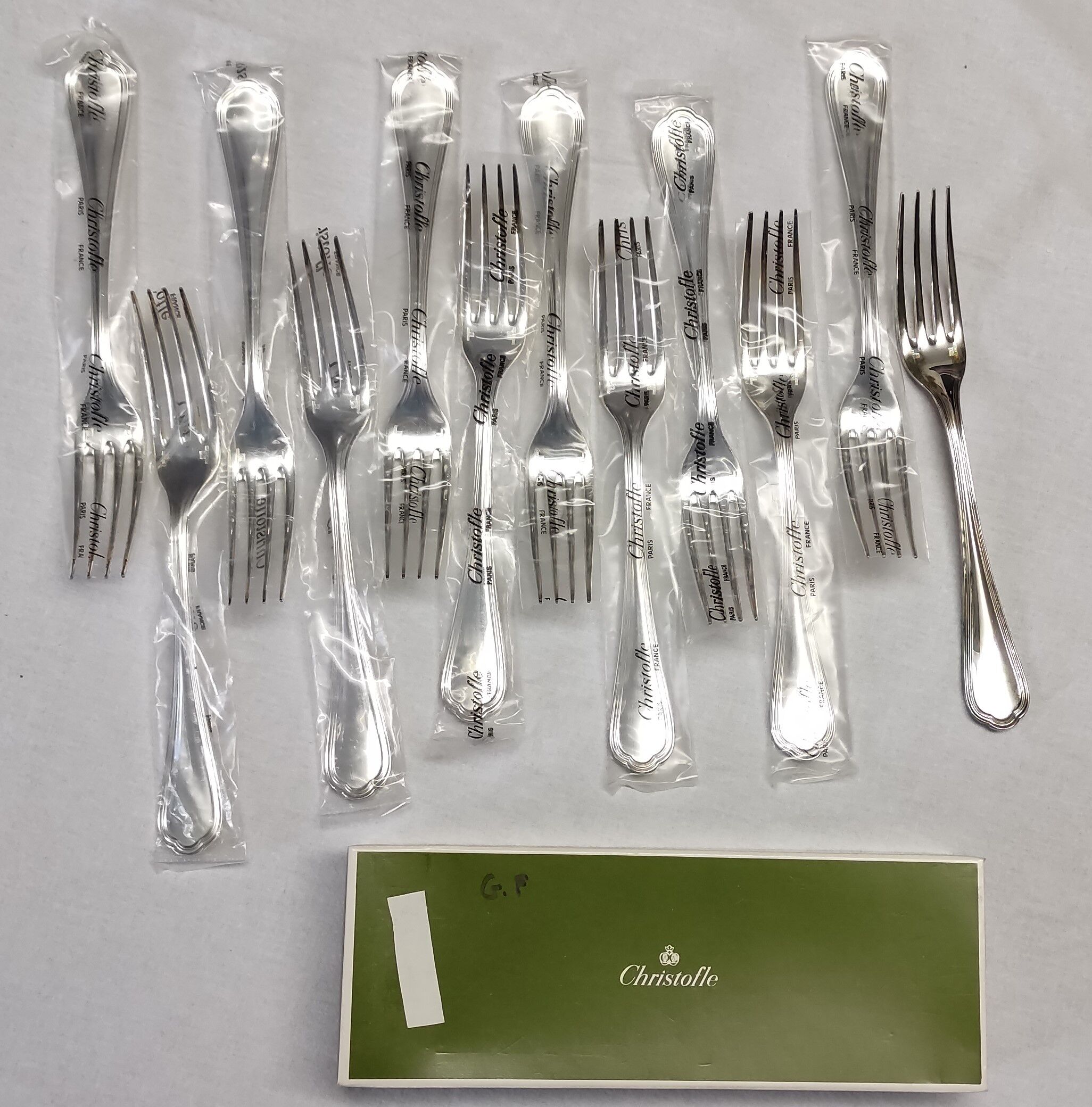 12 silver metal table forks from Christofle model "Spatours"