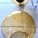 Set of 2 bubbled amber glass globe pendants