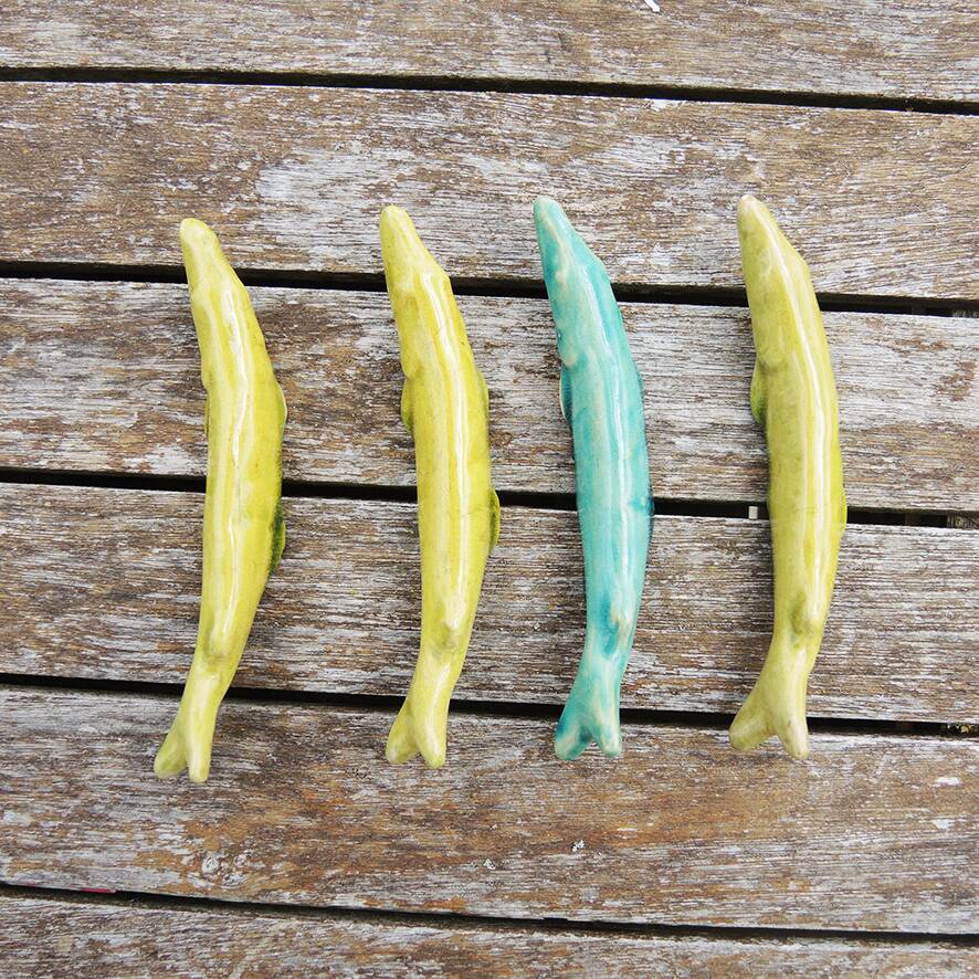 4 antique ceramic fish knife rests