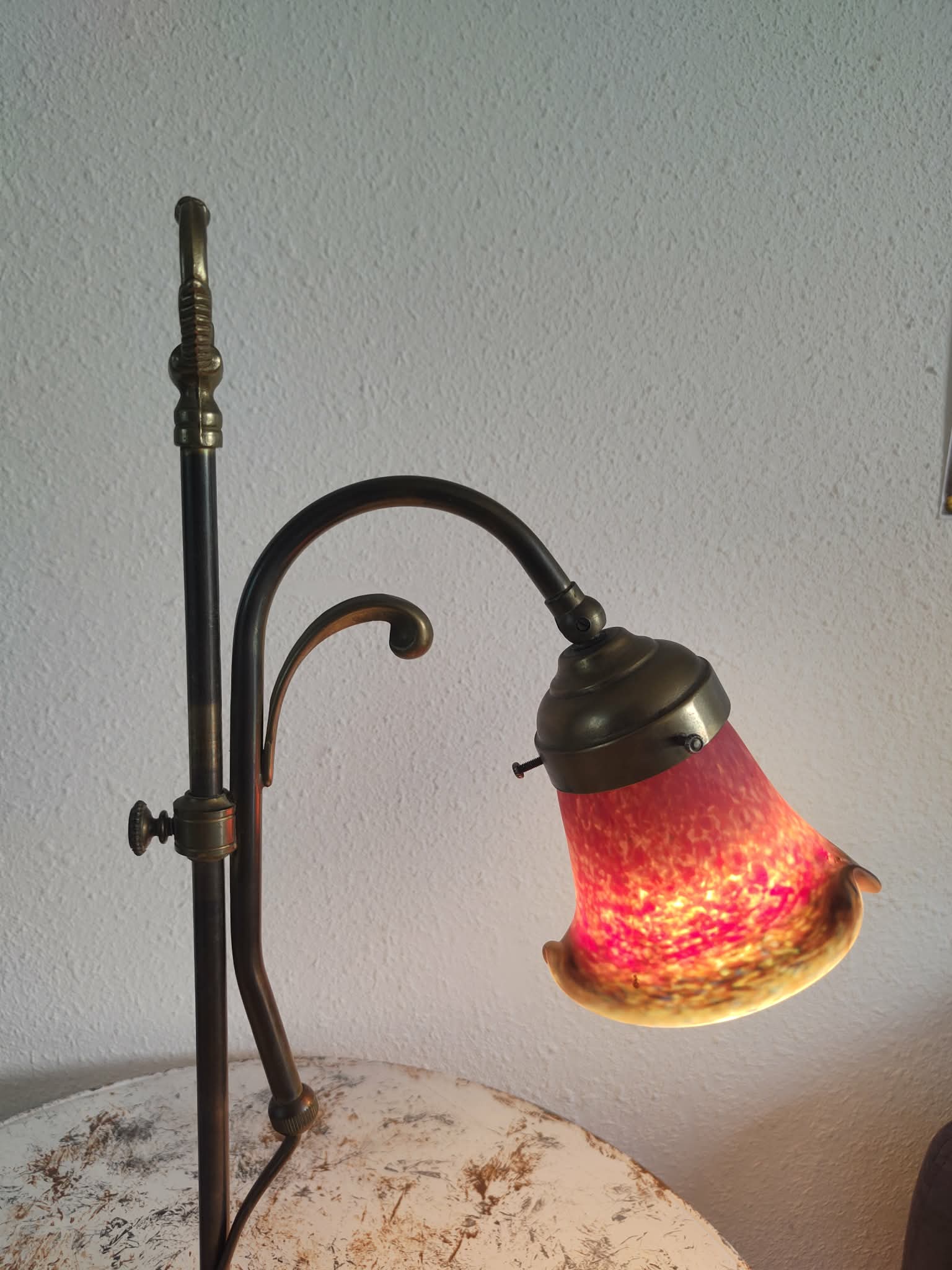 Brass articulated lamp with glass paste signed art of France.