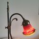 Brass articulated lamp with glass paste signed art of France.