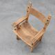 Brutalist armchair with carved rosettes and nailed wooden seat, Spain