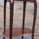 Louis XVI period pedestal table, in solid mahogany and veneer, and in gilded bronze.