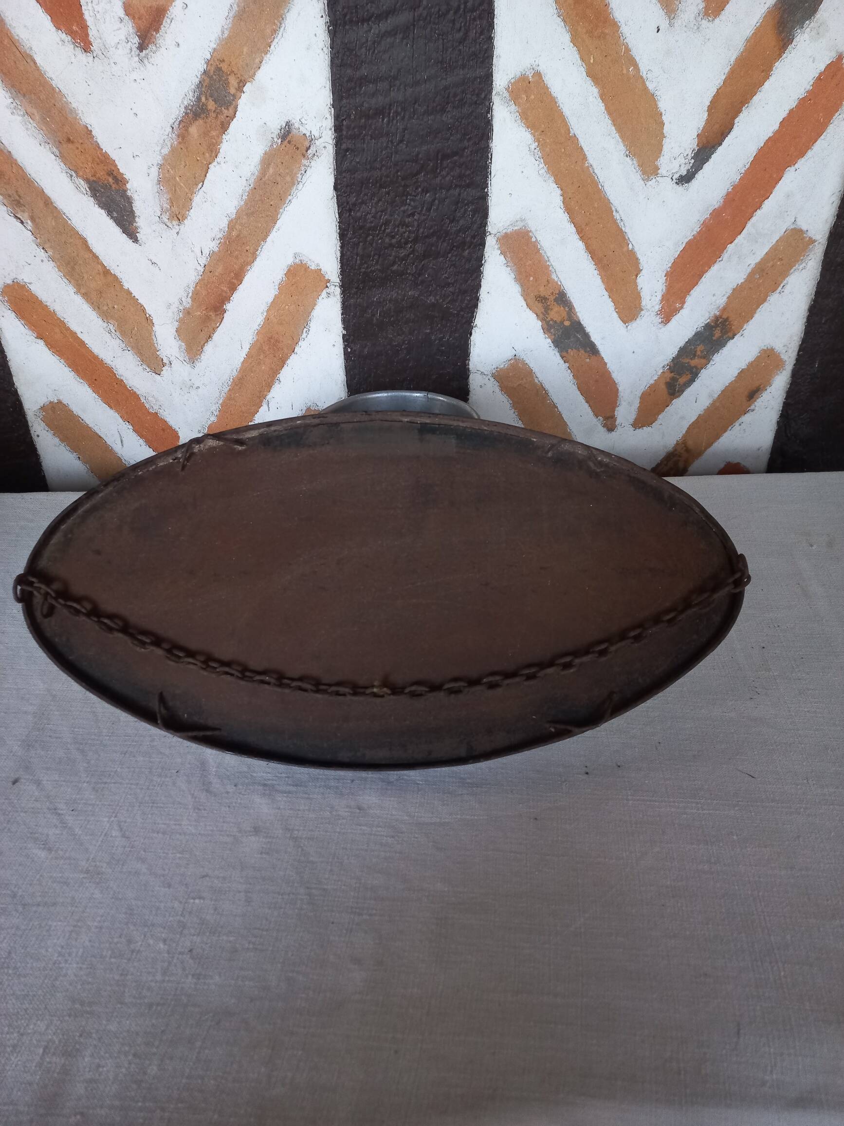 Antique free-form metal mirror