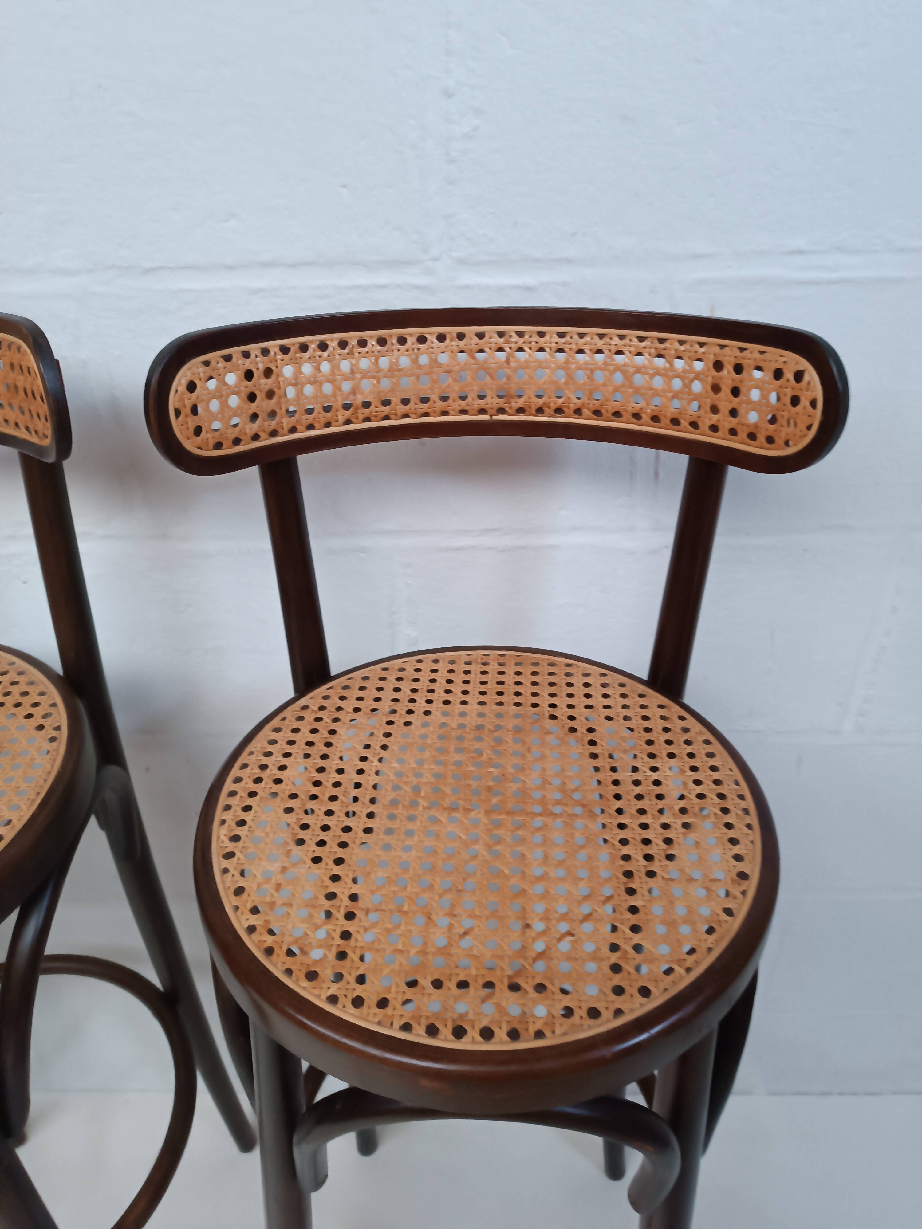 4 curved wood and cane bar stools