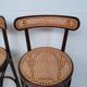 4 curved wood and cane bar stools
