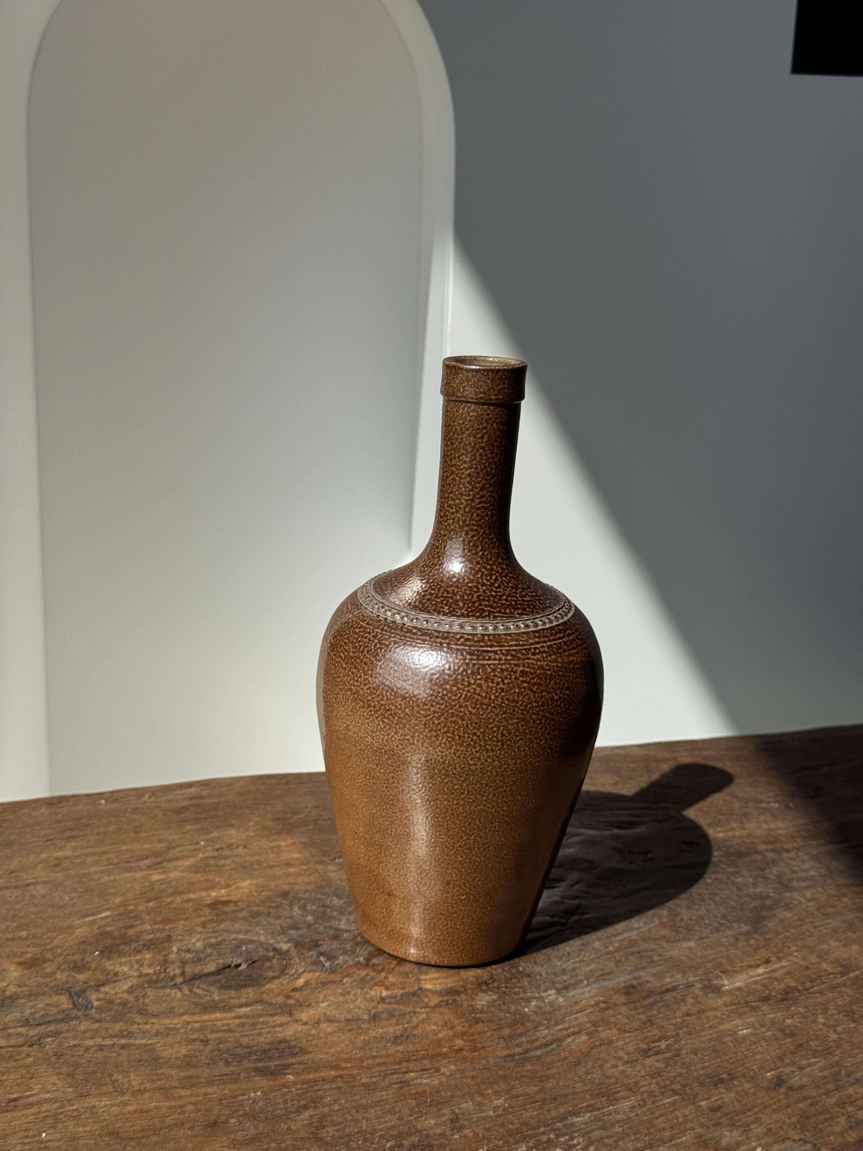 Sandstone demijohn in Pont des Vernes, France