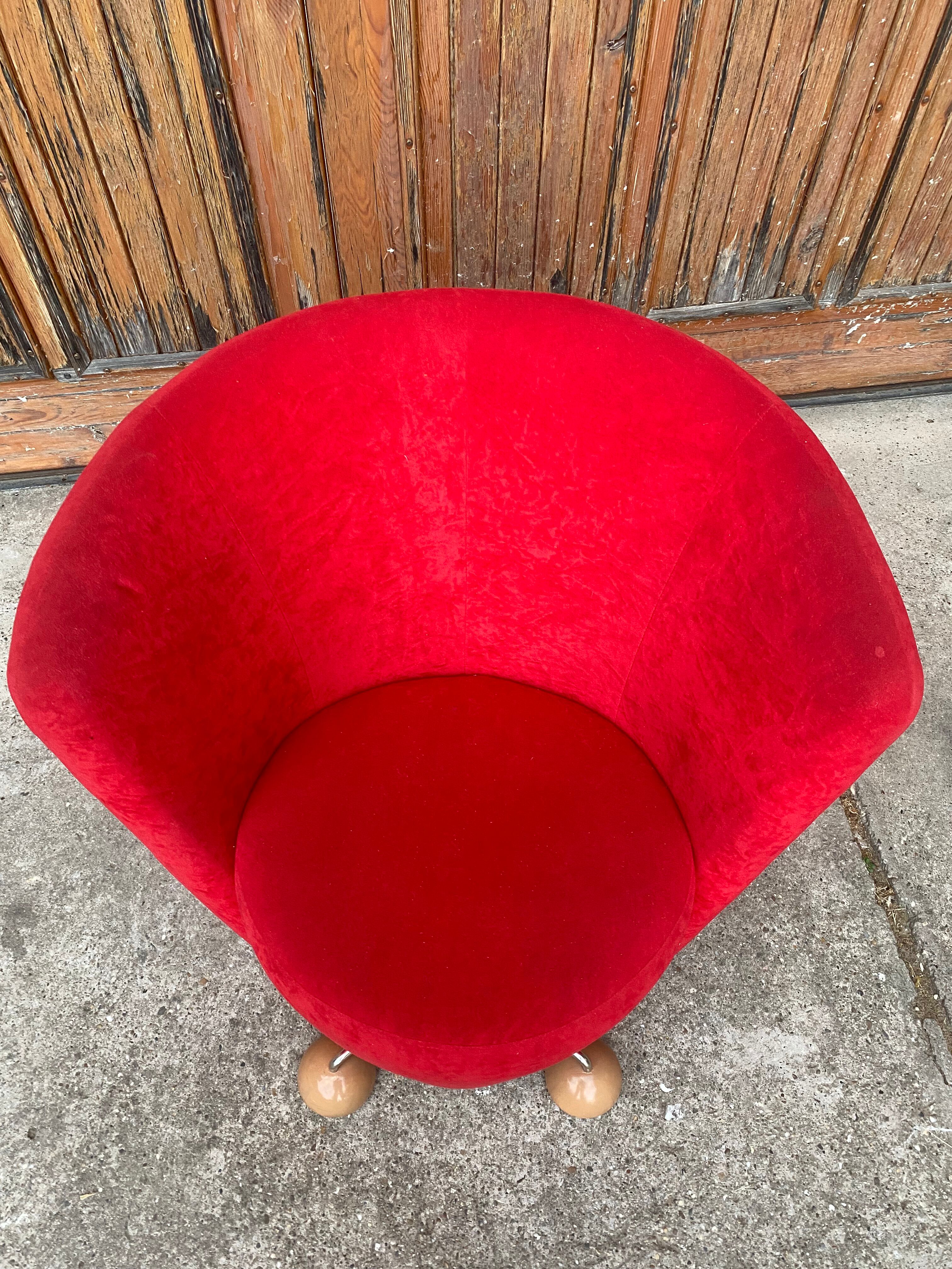 Mid-century red armchair with special legs