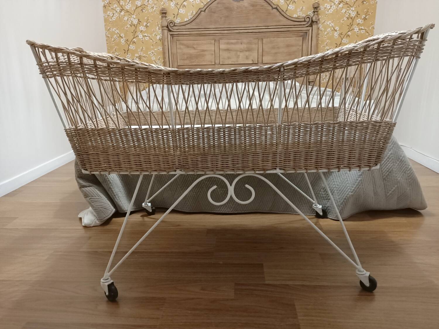 Rattan and wrought iron cradle